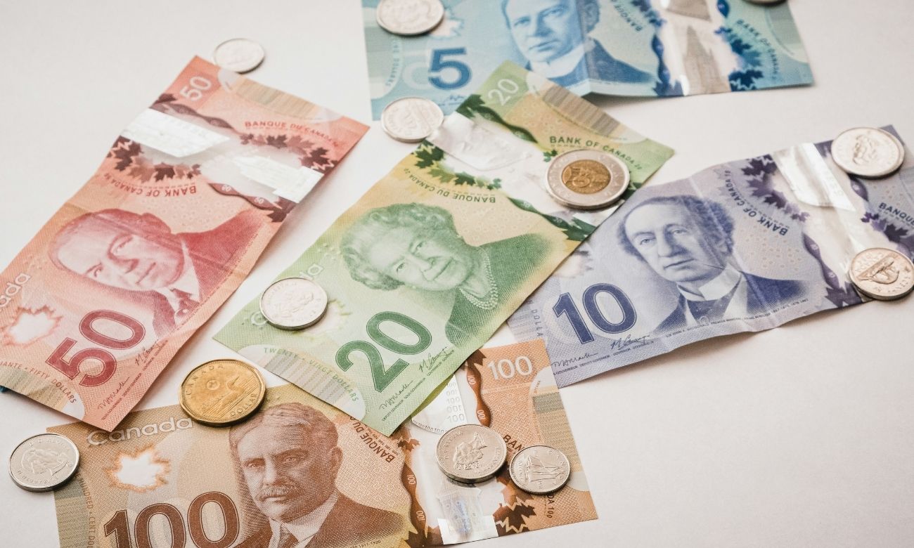 Canadian currency on table